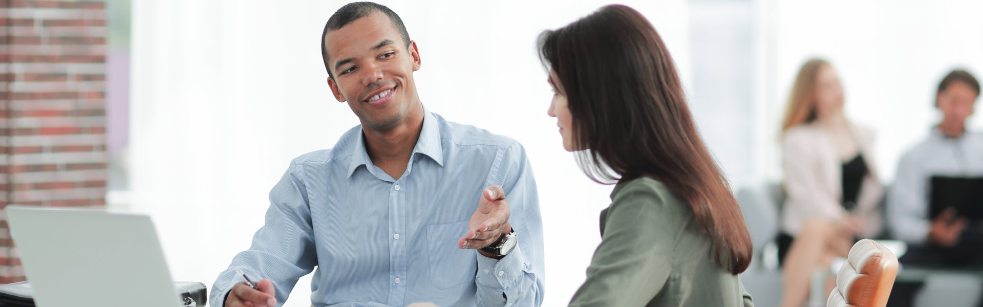 man talking to a woman