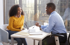 woman talking to an finance advisor