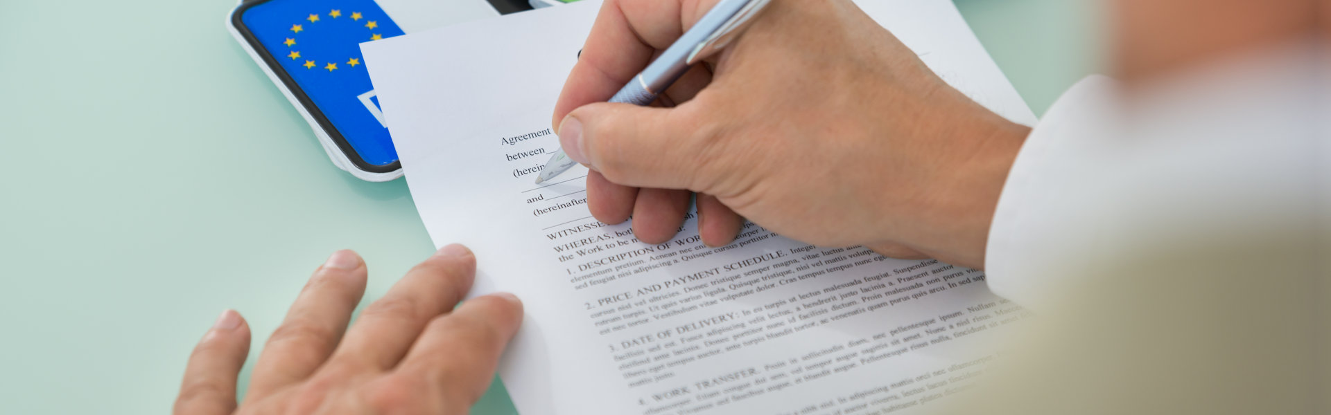 man filling up documents